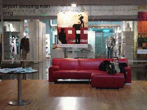 airport sleeping man